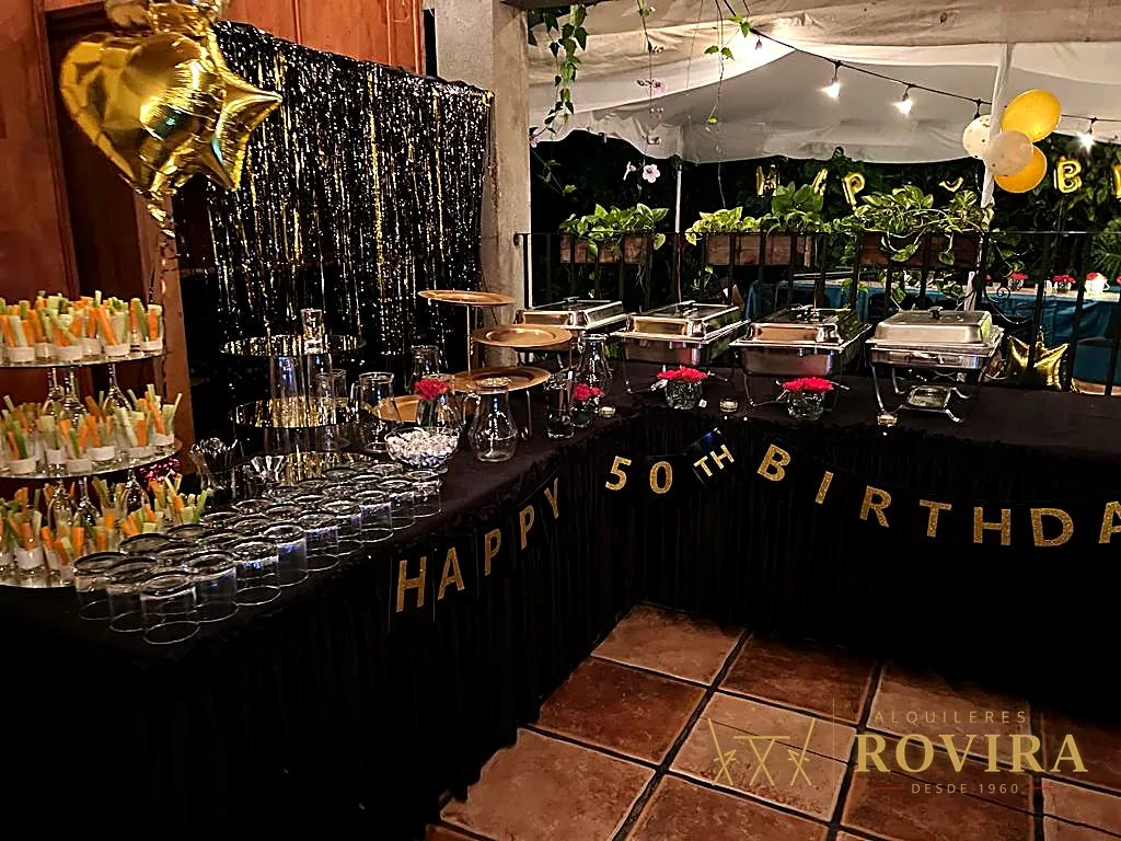 Buffet temático elaborado en una celebración producida por Rovira